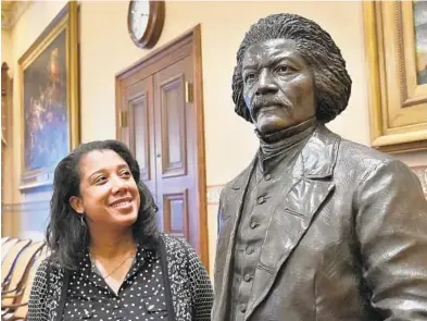  ?? AMY DAVIS/BALTIMORE SUN PHOTOS ?? Maya Davis was part of the team that worked on the conceptual­ization of statues of Frederick Douglass and Harriet Tubman.