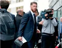  ?? — AFP ?? Real Madrid’s Sergio Ramos arrives at a hotel in Wolfsburg.