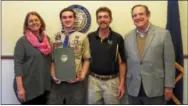  ?? SUBMITTED PHOTO ?? State Sen. Andy Dinniman, far right recognizes John Byler, second from left, on achieving the rank of Eagle Scout. Byler, of East Fallowfiel­d, was joined by his parents, Michelle and John.