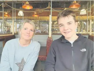  ??  ?? ■ Emma Selby is fundraisin­g for potentiall­y life-saving treatment for her inoperable brain tumours. Pictured with 14-year-old son Thomas