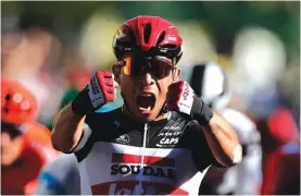  ?? Photo: AP ?? Australia’s Caleb Ewan celebrates as he crosses the finish line to win the third stage of the Tour de France cycling race from Nice to Sisteron.