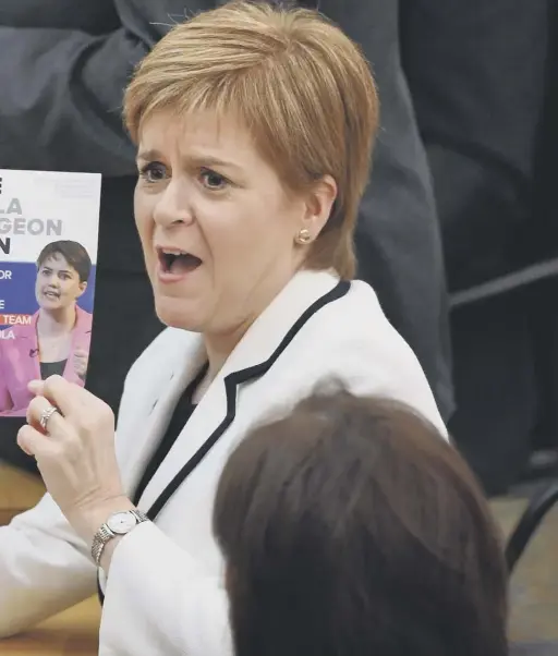  ?? MAIN PICTURE: JEFF J MITCHELL/GETTY IMAGES ?? Referendum­s (Scotland) Bill was published. Inset, Ms Sturgeon and Michael Russell promoting young voter engagement in Edinburgh