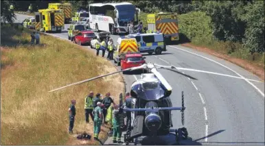  ??  ?? The scene on the A2050 at Harbledown after the crash in which two people died