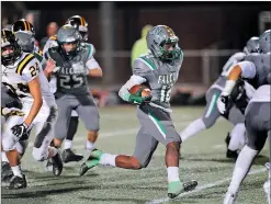  ?? Chris Kaufman/ Appeal-Democrat ?? CONTACT Sports Editor Jimmy Graben at 749-4791. River Valley High’s Jojo Penn looks for running room during Friday night’s Tri-County Conference matchup against Rio Linda in Yuba City.