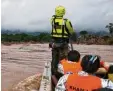  ?? Foto: Thai Rescue Team, afp ?? Thailändis­che Retter während eines Ein satzes in Laos.