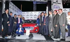  ??  ?? Dr Raghupati Singhania, CMD, JK Tyre &amp; Industries, presenting the ‘The Car of the Year Award 2019’ to Kenichi Ayukawa, MD and CEO, Maruti Suzuki, for the ‘Maruti Swift’ in presence of the jury members in Mumbai