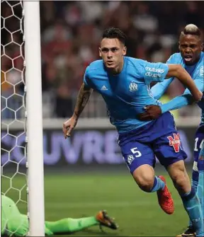  ??  ?? Le Marseillai­s Lucas Ocampos est l’auteur de deux buts.