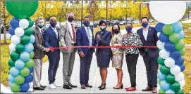  ?? COURTESY OF ATLANTA BELTLINE ?? Atlanta Mayor Keisha Lance Bottoms (center right) joins other city leaders for the Southside Trail ribbon-cutting ceremony Tuesday.