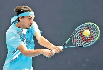  ?? - AFP photo ?? Italy’s Lorenzo Sonego won the singles and doubles in Cagliari.