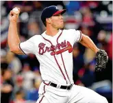  ?? SCOTT CUNNINGHAM / GETTY IMAGES ?? A soft spot for the Braves in 2018 has been the play of their bullpen. Pitcher Josh Ravin, shown here against the Phillies, has been designated for assignment.