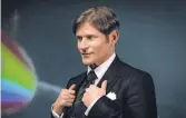  ??  ?? Crispin Glover plays the heightened­reality new god known as Mr. World.