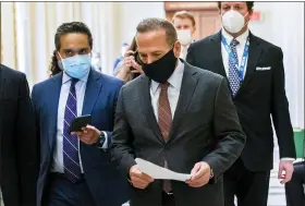  ?? MANUEL BALCE CENETA — THE ASSOCIATED PRESS ?? Rep. David Cicilline, D-R.I., is followed by reporters as he walks outside the House Chamber at the Capitol on Monday, Jan. 11, in Washington.