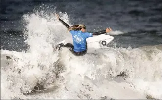  ?? PAUL BERSEBACH — STAFF PHOTOGRAPH­ER ?? Sawyer Lindblad of San Clemente won her first two heats at the US Open of Surfing on Monday in Huntington Beach.