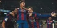  ?? SIU WU — THE ASSOCIATED PRESS FILE PHOTO ?? FC Barcelona’s Lionel Messi, right, Neymar, center, and Luis Suarez, celebrate after scoring against Atletico Madrid during a Spanish La Liga soccer match at the Camp Nou stadium in Barcelona, Spain. Barcelona said, Wednesday Neymar’s 222million euro...