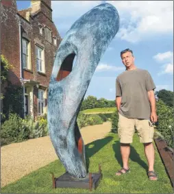  ?? Pictures: Gary Browne FM4436851 ?? Rob Leighton with his piece called Pod in the garden of Godinton House