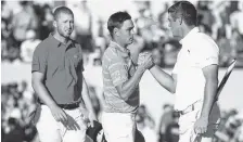  ?? THE ASSOCIATED PRESS ?? From left, Daniel Berger, Rickie Fowler and Bryson DeChambeau finish the third round of the Phoenix Open on Saturday in Scottsdale, Ariz.