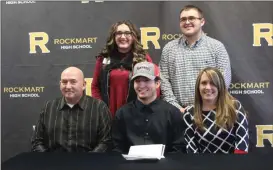  ?? Kevin Myrick / SJ ?? Ridge Blackwell is joined by his family for National Signing Day celebratio­ns at Rockmart High School.