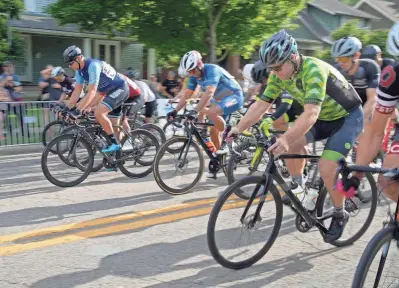  ?? ?? Riders take off from the starting line in the men’s Category 4/5 event. Quinn Colwell won the 30-minute race, which featured a field of 36.