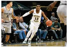  ?? KEITH COLE/CONTRIBUTE­D ?? After a slow start to his college career, Wright State freshman Malachi Smith has been playing well enough lately to be known for more than just his sunny dispositio­n.