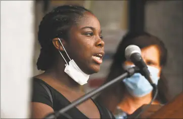  ?? Brian A. Pounds / Hearst Connecticu­t Media ?? At top, Ansonia High School senior Maliqa Mosley-Williams speaks outside Ansonia City Hall on June 4 during a gathering of local ministers, political leaders and residents in response to national incidents of police brutality.