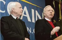  ?? Hearst Connecticu­t Media file photo ?? Republican Presidenti­al hopeful, U.S. Sen. John McCain, R-Ariz., left, listens as he gets the endorsemen­t from former Democratic vice presidenti­al candidate, U.S. Sen. Joe Lieberman, I-Conn., Dec. 17, 2007, at the American Legion in Hillsborou­gh, N.H.