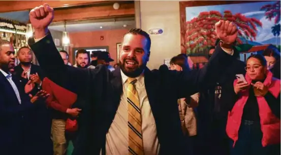  ?? BARRY CHIN/GLOBE STAFF ?? Enrique Pepén celebrated his victory at his watch party at Guira y Tambora in Roslindale Tuesday night.