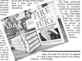  ?? — AFP file photo ?? Copies of the book ‘Fire and Fury’ are displayed on a shelf at Book Passage recently in Corte Madera, California.