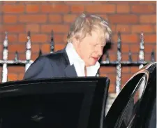  ??  ?? Boris Johnson leaves Carlton House Terrace in Westminste­r, London, after resigning as foreign secretary. Photo: PA