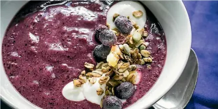  ?? PHOTO: MAARTEN HOLL/FAIRFAX NZ ?? This blueberry smoothie bowl is a thicker and prettier alternativ­e to a smoothie drink.