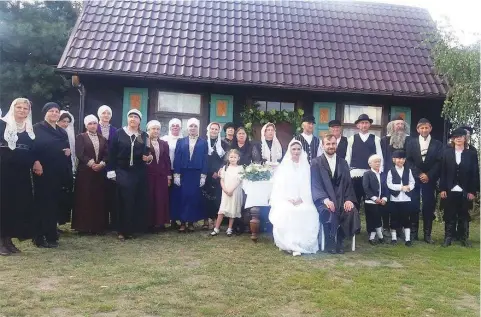  ??  ?? VILLAGERS ATTEND a fake Jewish wedding in the Polish village of Radzanow last week.