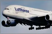  ?? ASSOCIATED PRESS ?? AN AIRBUS A 380 of Lufthansa airline approaches the airport in Frankfurt, Germany, Thursday. The European plane manufactur­er Airbus said Thursday it will stop making its superjumbo A380 in 2021 for lack of customers.