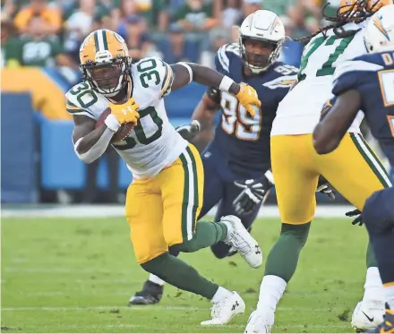  ?? RICHARD MACKSON / USA TODAY SPORTS ?? Green Bay Packers running back Jamaal Williams had only two carries against the Los Angeles Chargers on Sunday.