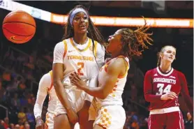  ?? AP FILE PHOTO/WADE PAYNE ?? Tennessee forward Rickea Jackson, left, and guard Jasmine Powell, right, both played key roles Sunday as the Lady Vols celebrated senior day by beating Auburn for their 20th win of the season.
