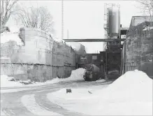  ?? SPECIAL TO THE ST. CATHARINES STANDARD ?? The Welland Canal was closed in 1929 but the lock was there in the 1940s and was used for gunnery practice during the Second World War. In this photo, taken in 1979, concrete manufactur­ers were using the area.