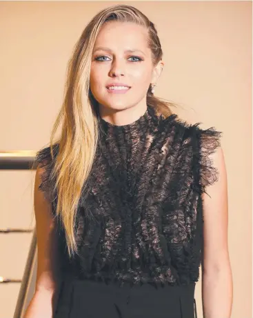  ?? Main picture: CHRISTIAN GILLES; Below: GETTY IMAGES ?? TOP CHOICE: Teresa Palmer (above) will star as Melbourne Cup winning jockey Michelle Payne (below) in Ride Like A Girl.