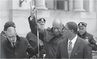  ?? AP Photo/Matt Slocum ?? ■ Bill Cosby waves as he departs his sexual assault trial Thursday at the Montgomery County Courthouse in Norristown, Pa.