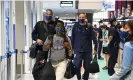  ??  ?? The United States basketball team arrives at Narita airport in Tokyo. Photograph: Ramiro Agustin Vargas Tabares/ZUMA Press Wire/REX/Shuttersto­ck