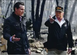  ?? EVAN VUCCI — THE ASSOCIATED PRESS ?? President Donald Trump talks with then-California Gov.-elect Gavin Newsom during a visit to a neighborho­od affected by the wildfires in Paradise in 2018.