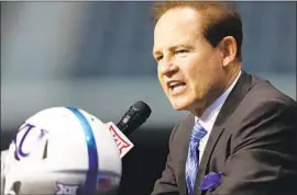  ?? David Kent Associated Press ?? LES MILES, who won a national championsh­ip at Louisiana State, would be considered a miracle worker if he could pull off the same thing at Kansas.