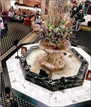  ?? St. Louis Post-Dispatch/TNS/GABE HARTWIG ?? The famous Peabody ducks fountain. spend their days paddling around the historic hotel’s ornate lobby