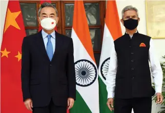  ?? ANI ?? External Affairs Minister S. Jaishankar meets Chinese Foreign Minister Wang Yi, at Hyderabad House, in New Delhi on Friday.