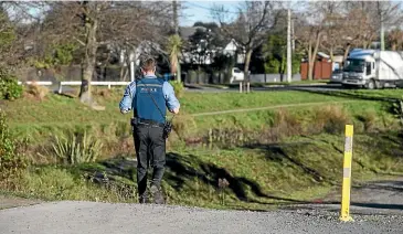  ?? DAVID WALKER/ STUFF ?? Police at the scene near the Gayhurst Rd bridge in Christchur­ch where Steffan Pearce-Loe, 30, was fatally struck by a car that then allegedly failed to stop. It has now emerged that the victim was himself mourning the death of a friend when he was left...