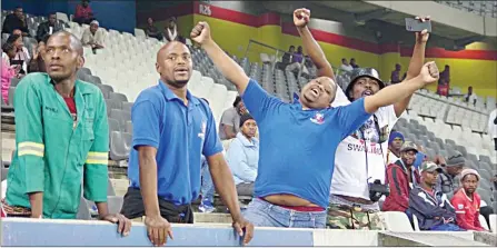  ?? (Pic: Mongameli Mabuza) ?? SWALIMO members celebratin­g the Sihlangu loss after the game.