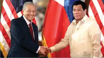  ?? (PCOO) ?? President Rodrigo Duterte and Prime Minister Mohammad Mahathir