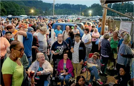  ?? PHOTOS: REUTERS ?? People wait to receive medical and dental care at the Remote Area Medical Clinic in Wise, Virginia.