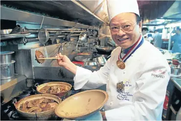  ?? Picture: Reuters ?? Michelin-starred chef Yeung Koon-yat of Hong Kong cooks abalone. Poaching has depleted stocks in the Western Cape, from where the seafood is smuggled to Hong Kong and other parts of East Asia.