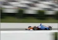  ?? MATT SLOCUM — THE ASSOCIATED PRESS ?? Scott Dixon practices for Sunday’s IndyCar series auto race, Saturday in Long Pond, Pa.