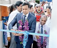  ??  ?? Dr. Hiran Hettiarach­chi, Group Chairman, Blue Mountain at the ribbon-cutting ceremony