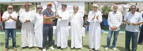  ??  ?? Salman Stores captain receiving winner’s trophy