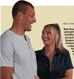  ?? MATT STONE / HERALD STAFF FILE ?? Rob Gronkowski and girlfriend Camille Kostek turned the Seaport Common into a dance floor at a free fitness class.